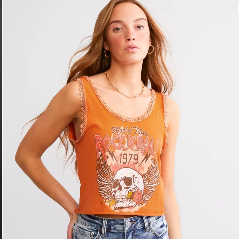 World Tour Cropped Tank Top
GOODIE TWO SLEEVES